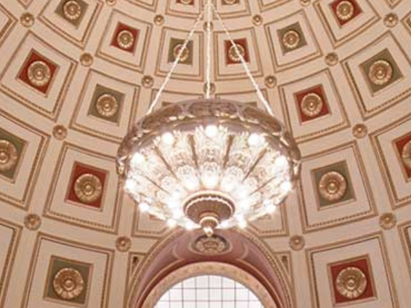 Photo of ceiling and chandelier in the Atascadero City Hall lobby.