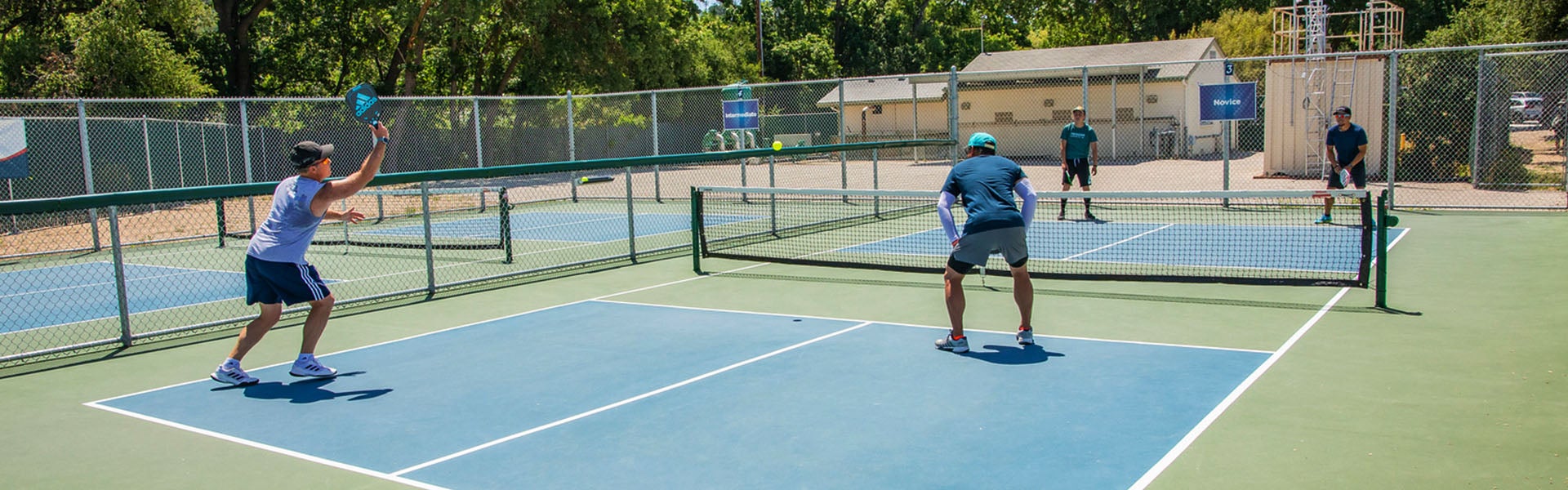 Pickleball players in action.