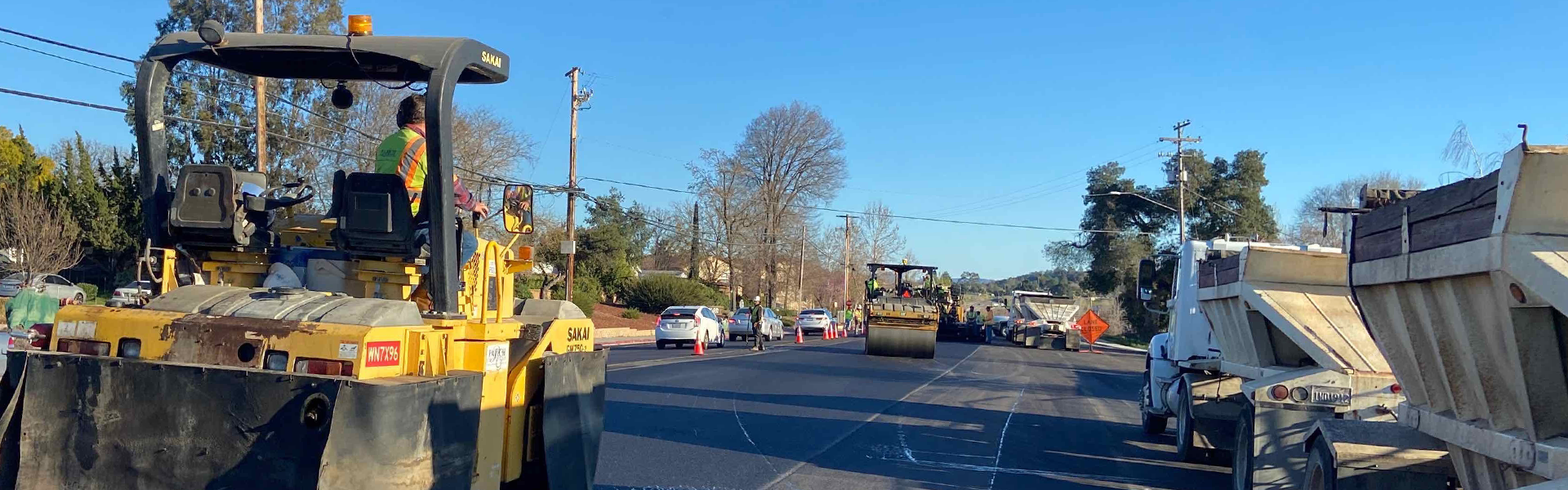 Image of large equipment and road repairs underway.