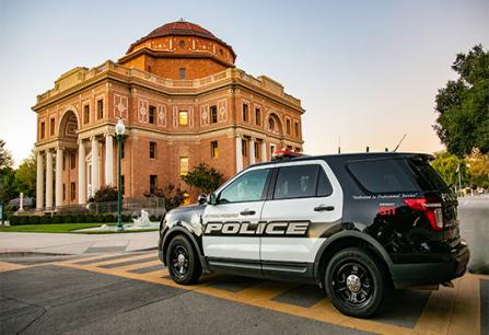 Police vehicle in front of city hall