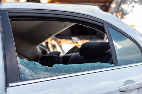 A broken window of a car