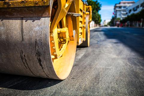 Steamroller fixing streets