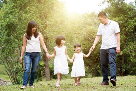 A happy family taking a walk