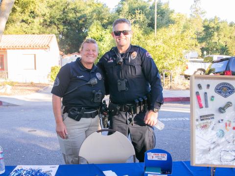 Police officers at National Night Out booth.