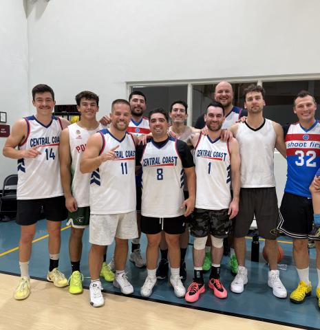 A team picture of an adult basketball team after winning the spring 2026 championship!