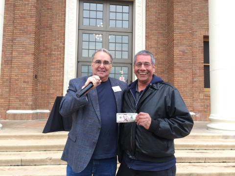 Albert Almodova, standing with prior Mayor Tom O'Malley, holding a five-dollar bill and receiving 4th place People's Choice Award at the Atascadero Tamale Festival.